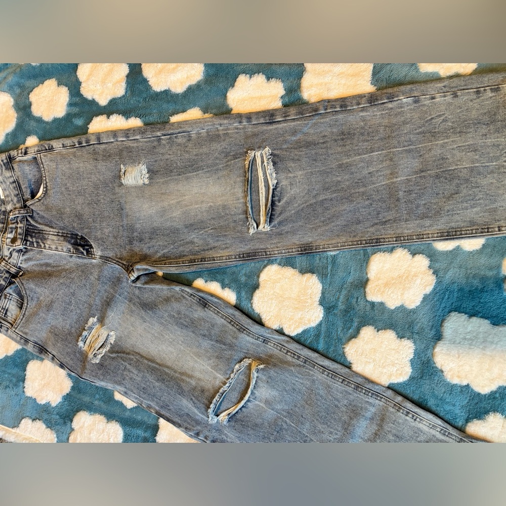 Distressed Blue Jeans